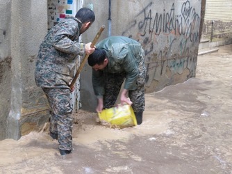 گزارش تصویری از فعالیت سپاه و بسیج در امداد رسانی به سیل زدگان شرق شیراز
